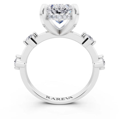 Platinum Oval Cut Diamond Solitaire Ring with Floating Diamond Accents - through finger