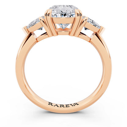 18 KT Rose Gold Pear Cut Diamond Three Stone Ring with Trillion Accents - through finger
