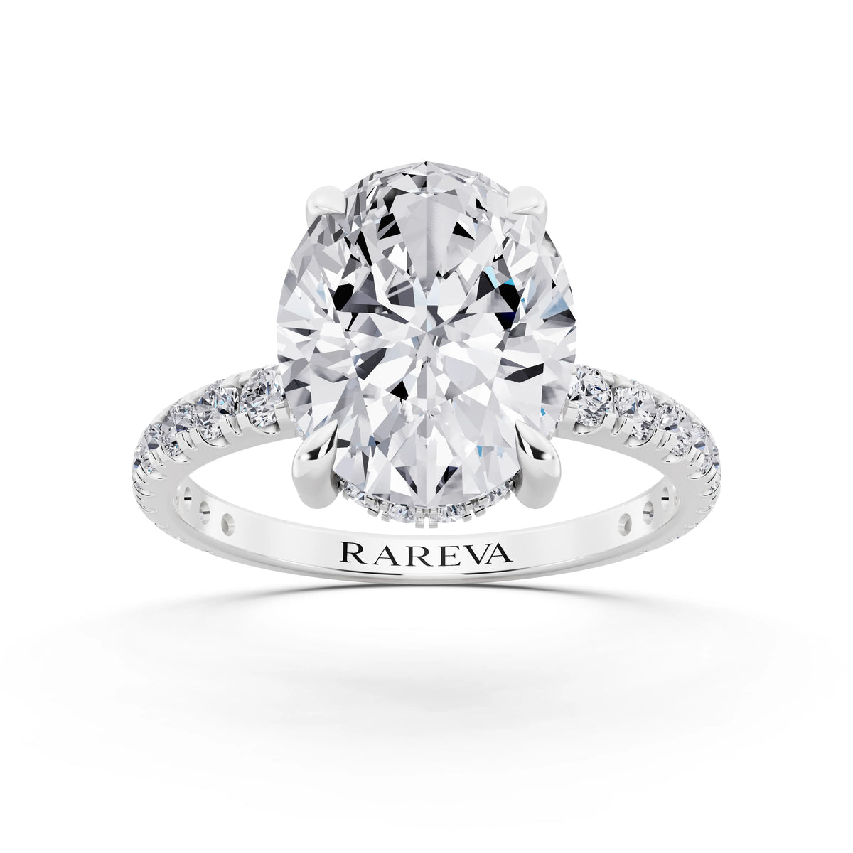 14 KT White Gold Oval Cut Diamond Solitaire Ring with Hidden Halo and French Pave Band - front view