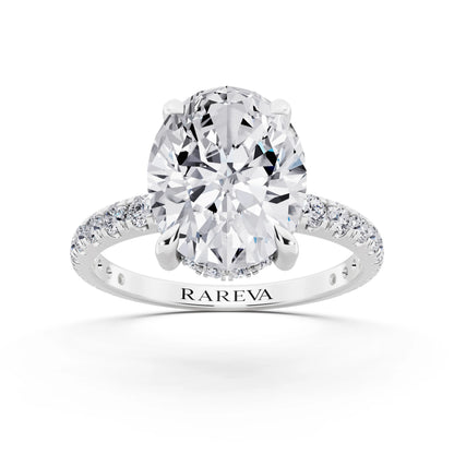 14 KT White Gold Oval Cut Diamond Solitaire Ring with Hidden Halo and French Pave Band - front view