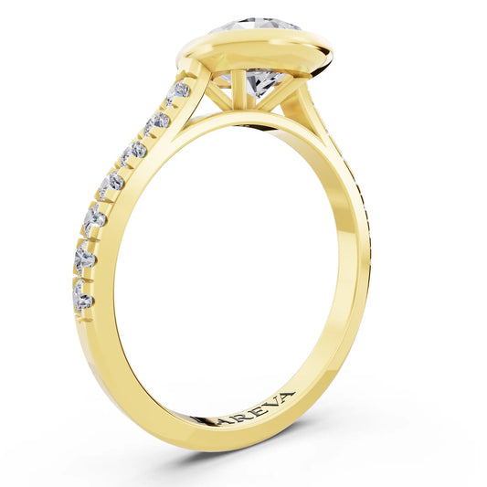 18 KT Yellow Gold Pear Cut Diamond Bezel Set Ring with Pave Band - Top view