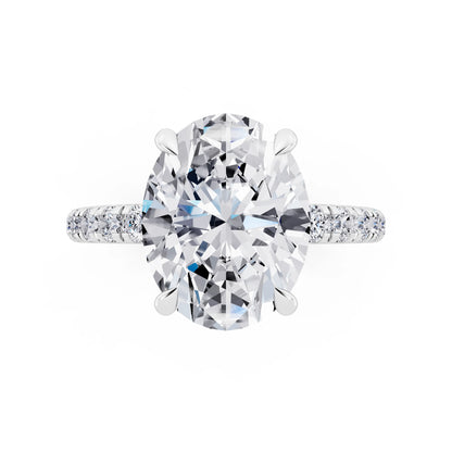 14 KT White Gold Oval Cut Diamond Solitaire Ring with Hidden Halo and French Pave Band - top angle
