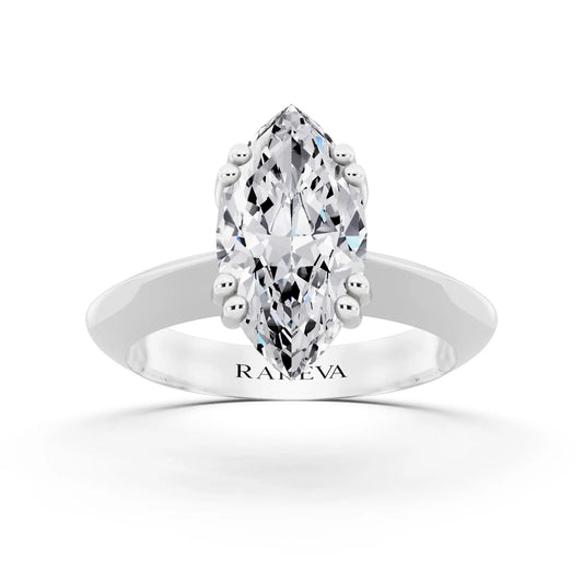 18 KT White Gold Marquise Cut Diamond Solitaire Ring with Knife Edge Band - front view