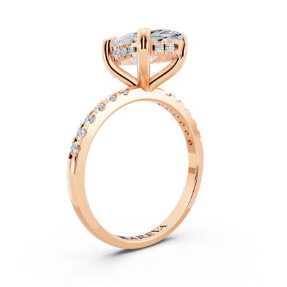 18 KT Rose Gold Marquise Cut Diamond Solitaire Ring with Round Pavé Band and Prong Setting - top view