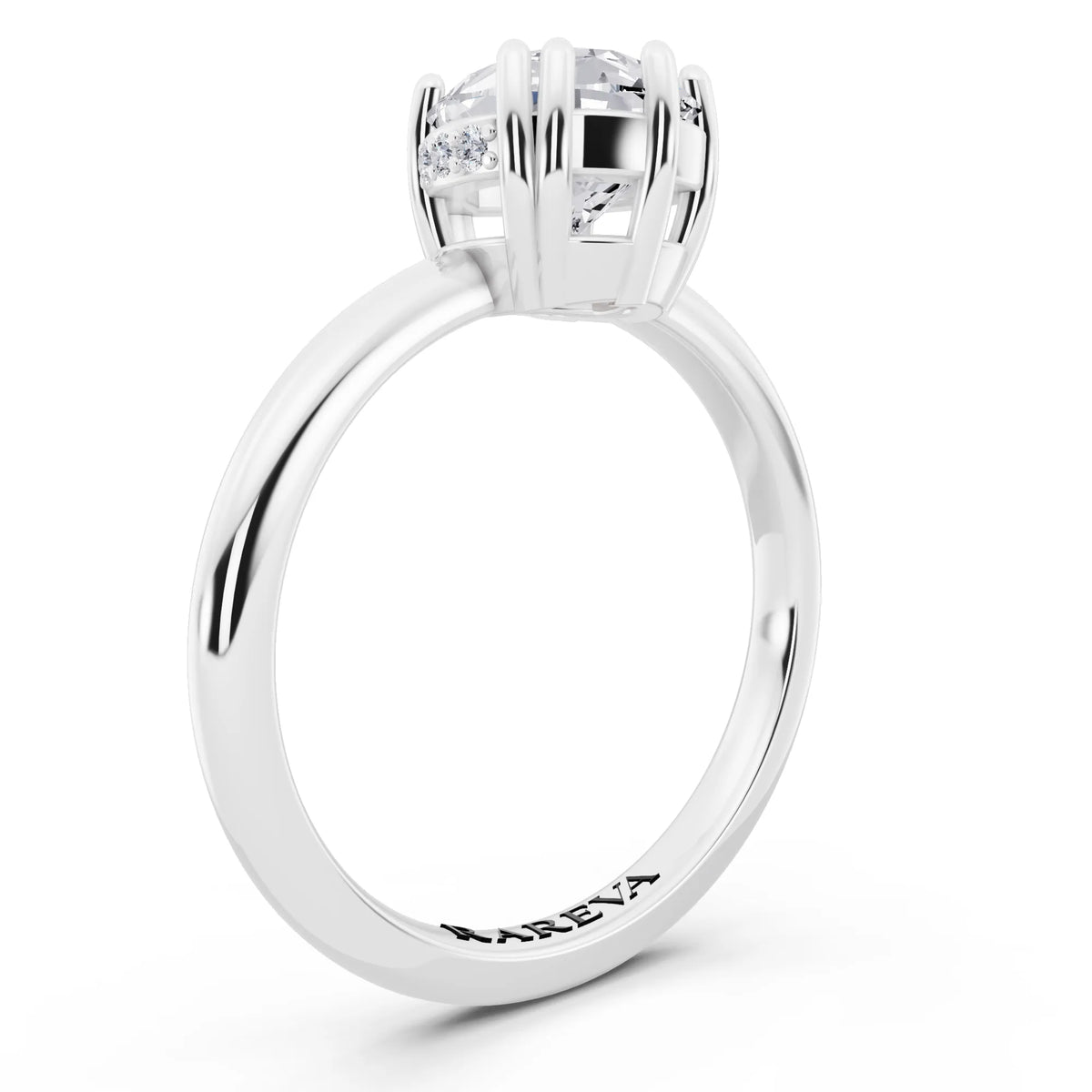 Platinum Pear Cut Diamond Solitaire Ring with Hidden Accent Basket - top view