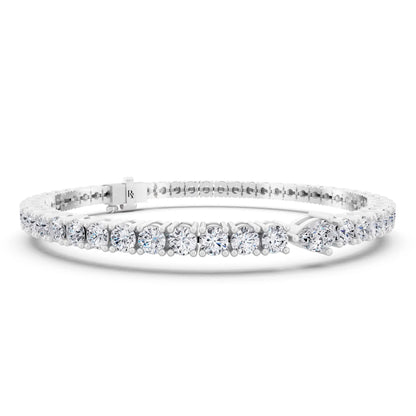 Platinum Round Cut Diamond Tennis Bracelet with Pear Accent - Top1