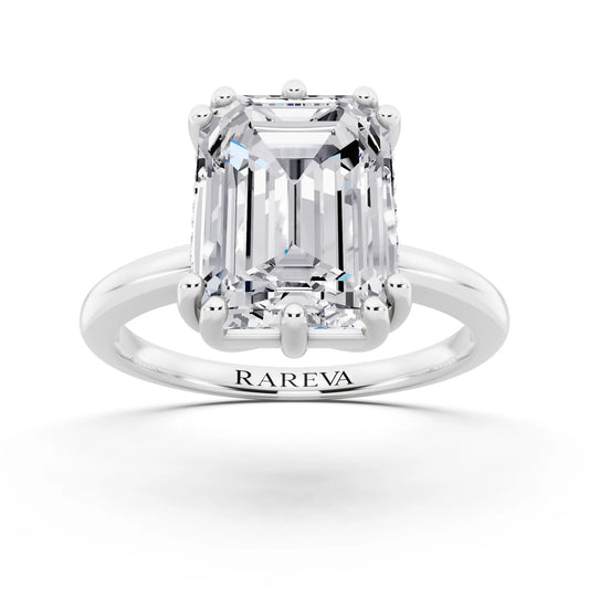 14 KT White Gold Emerald Cut Diamond Solitaire Ring with Hidden Accent Basket - front view