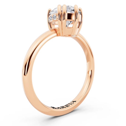 18 KT Rose Gold Pear Cut Diamond Solitaire Ring with Hidden Accent Basket - top view