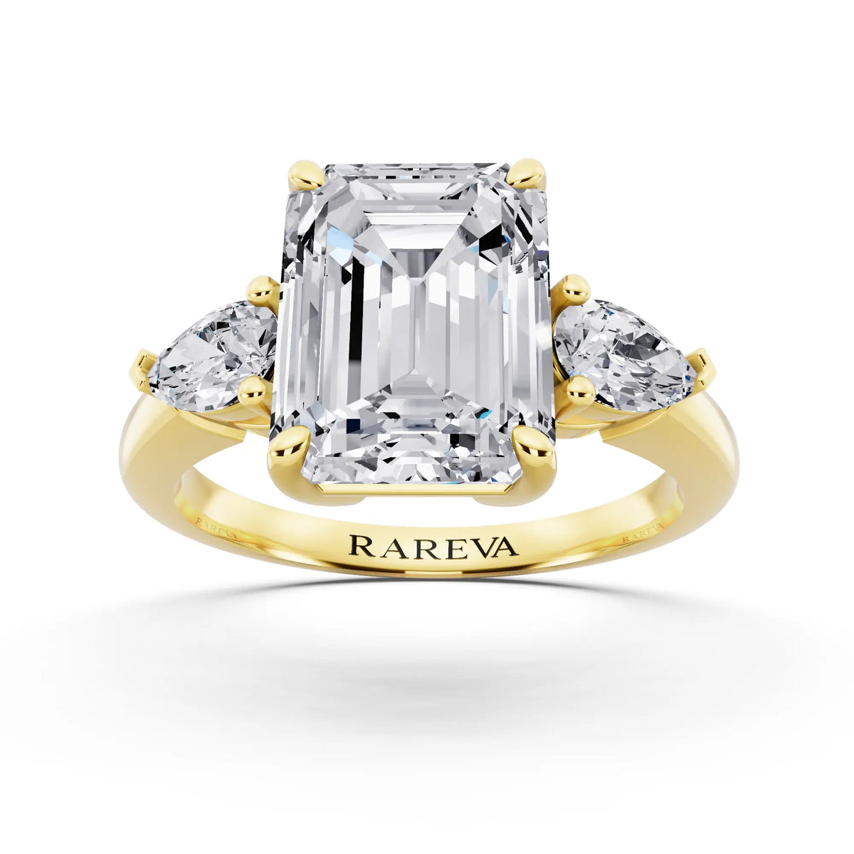 18 KT Yellow Gold Emerald Cut Diamond Three Stone Pear Accent Ring - front view