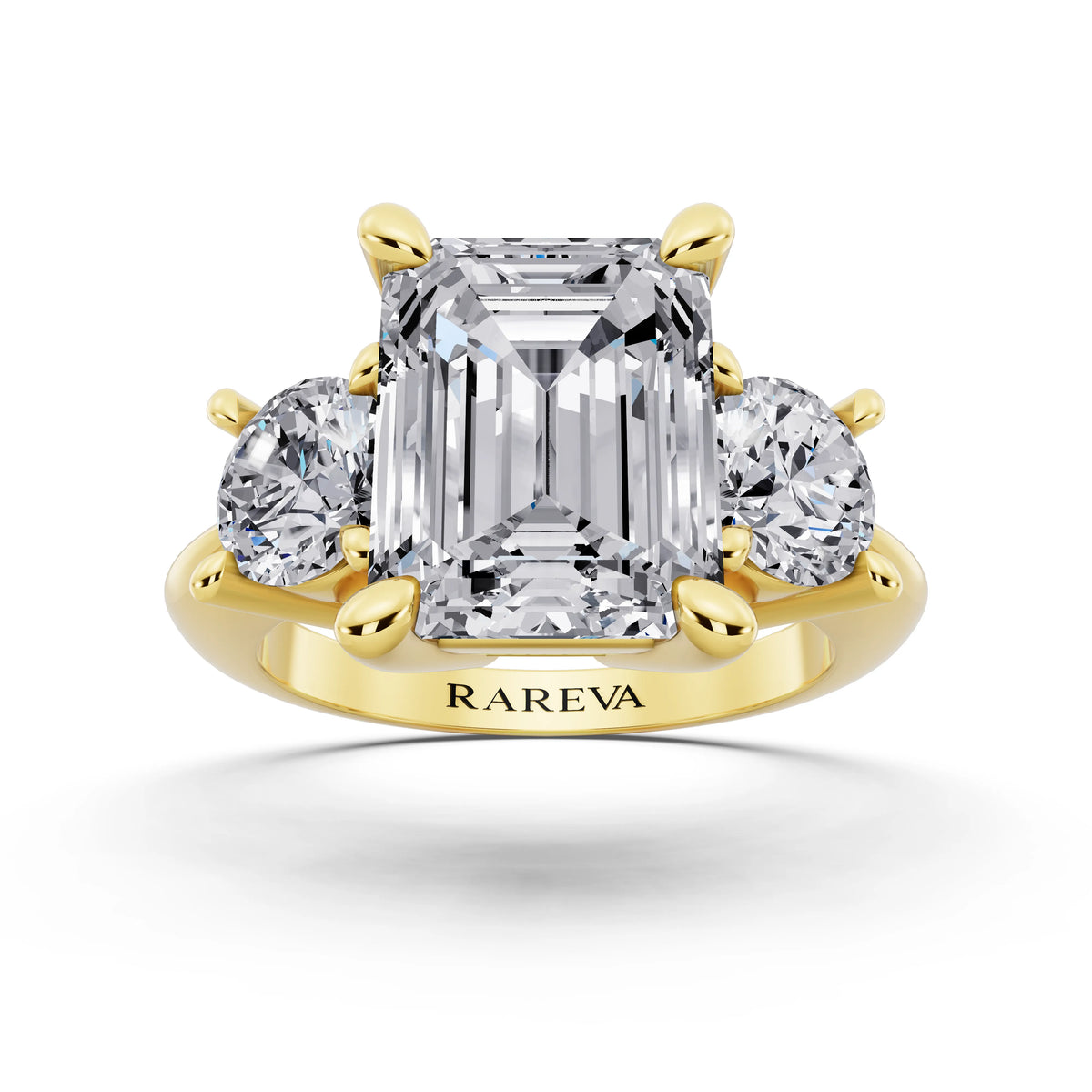 18 KT Yellow Gold Emerald Cut Diamond Three Stone Ring with Round Accents - front view