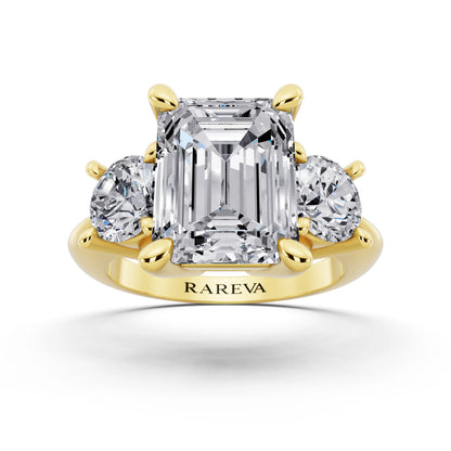 18 KT Yellow Gold Emerald Cut Diamond Three Stone Ring with Round Accents - front view