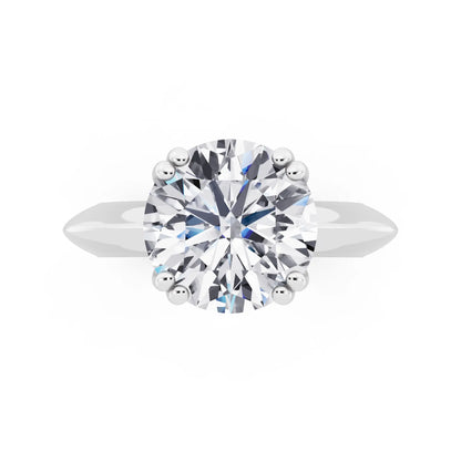 Platinum Round Cut Diamond Solitaire Ring with Knife Edge Band - top angle