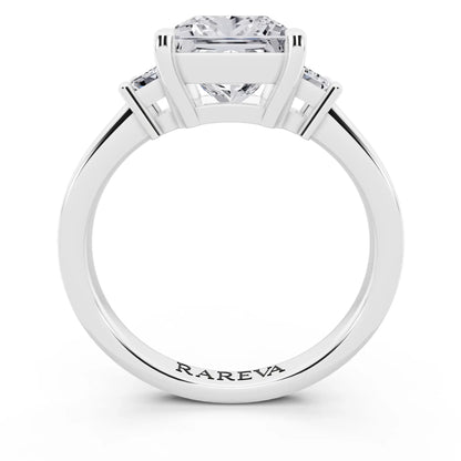 18 KT White Gold Princess Cut Diamond Three Stone Emerald Accent Ring - through finger