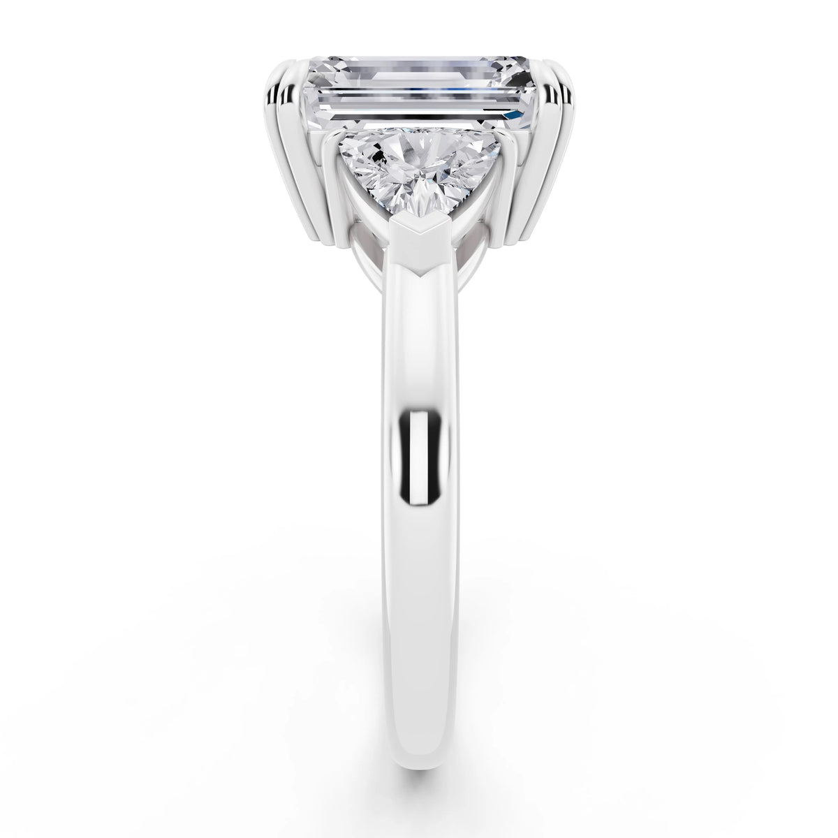 14 KT White Gold Emerald Cut Diamond Three Stone Ring with Trillion Accents - side view