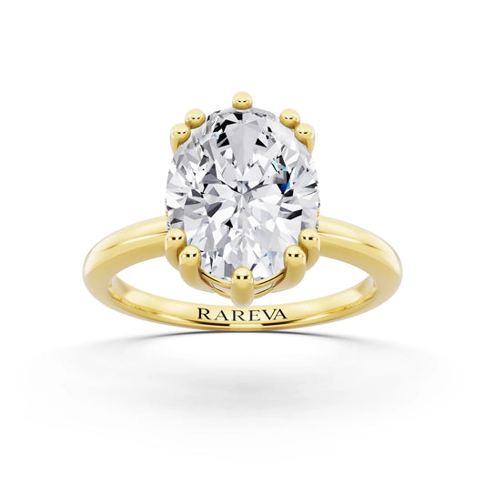 14 KT Yellow Gold Oval Cut Diamond Solitaire Ring with Hidden Accent Basket - front view