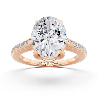 14 KT Rose Gold Oval Cut Diamond Claw Prong Solitaire Ring with French Pave Band - front view