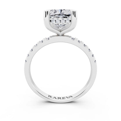 Platinum Cushion Cut Diamond Solitaire Ring with Round Pavé Band and Prong Setting - through finger