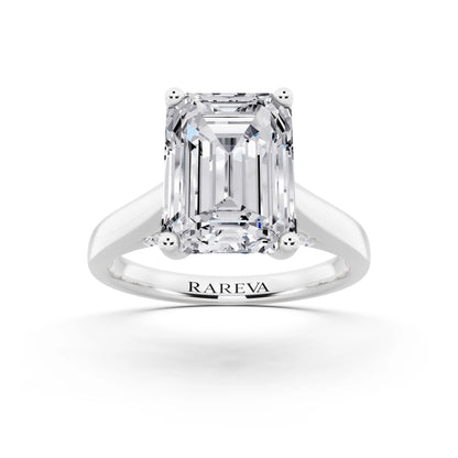 Platinum Emerald Cut Diamond Solitaire Ring with Hidden Accent - front view