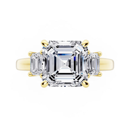 18 KT Yellow Gold Asscher Cut Diamond Three Stone Emerald Accent Ring - top angle
