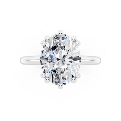 Platinum Oval Cut Diamond Solitaire Ring with Hidden Accent Basket - top angle