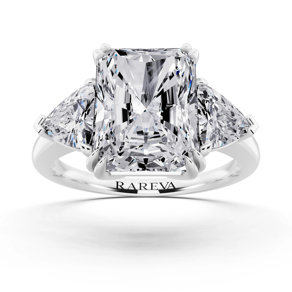 18 KT White Gold Radiant Cut Diamond Three Stone Ring with Trillion Accents - front view