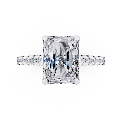 18 KT White Gold Radiant Cut Diamond Claw Prong Solitaire Ring with French Pave Band - top angle