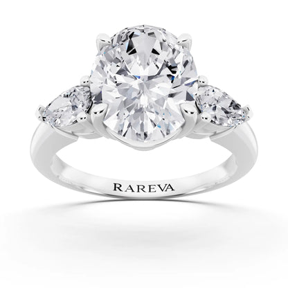 Platinum Oval Cut Diamond Three Stone Pear Accent Ring - front view