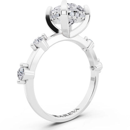 14 KT White Gold Pear Cut Diamond Solitaire Ring with Floating Diamond Accents - top view