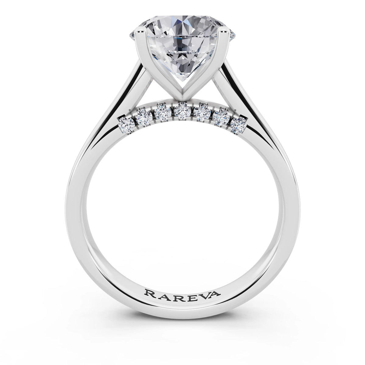 Platinum Round Cut Diamond Solitaire Ring with Hidden Accent - through finger