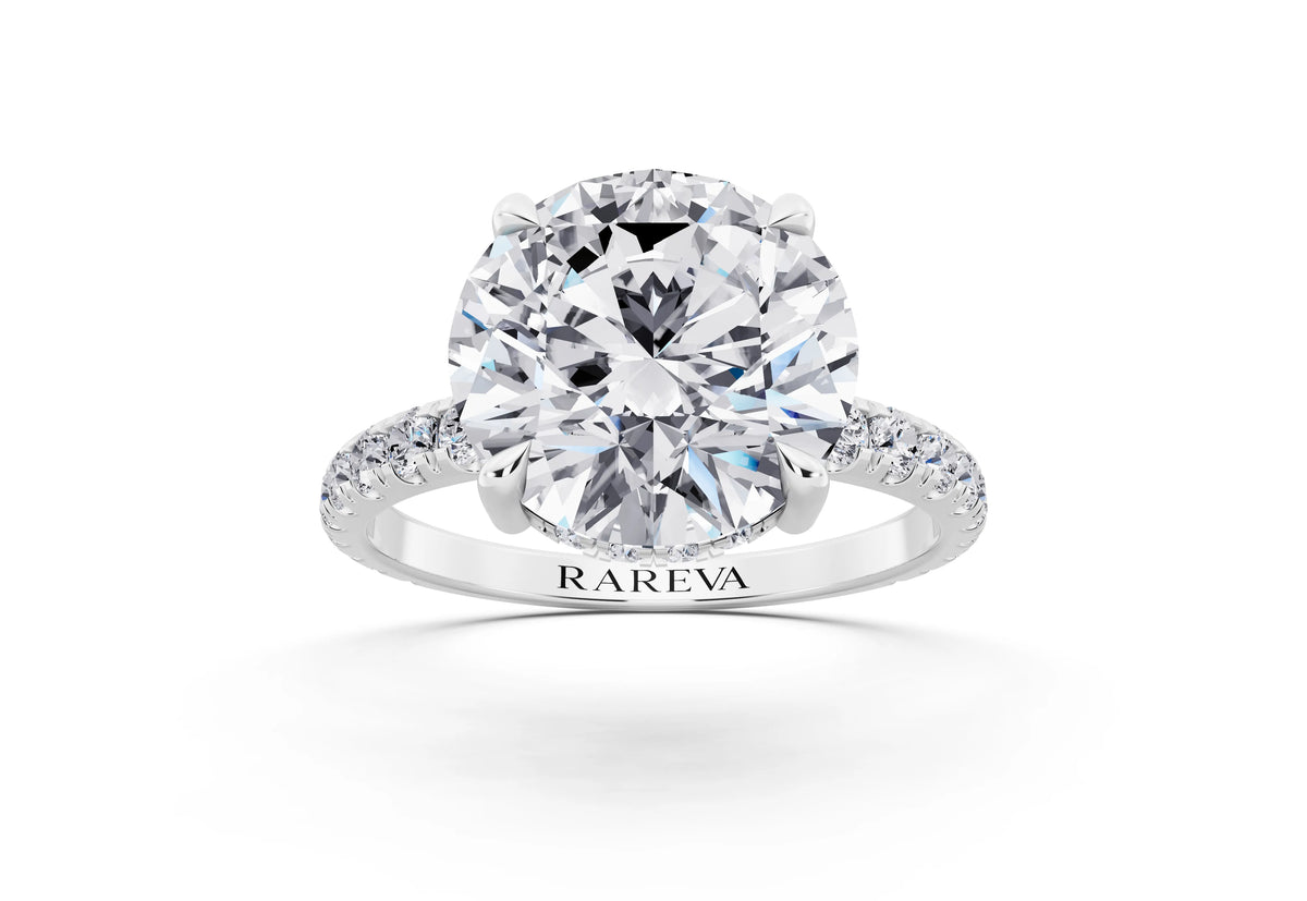 18 KT White Gold Round Cut Diamond Solitaire Ring with Hidden Halo and French Pave Band - front view