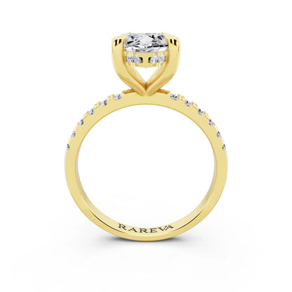 18 KT Yellow Gold Marquise Cut Diamond Solitaire Ring with Round Pavé Band and Prong Setting - through finger