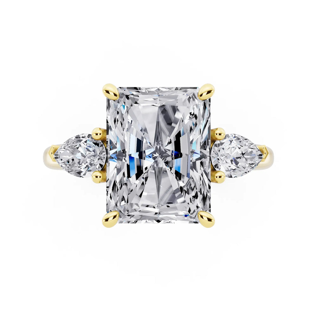 14 KT Yellow Gold Radiant Cut Diamond Three Stone Pear Accent Ring - top angle