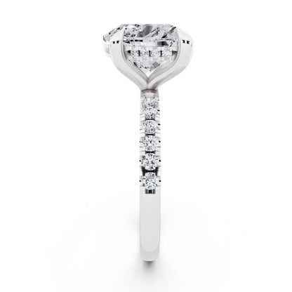 14 KT White Gold Heart Cut Diamond Solitaire Ring with Round Pavé Band and Prong Setting - side view