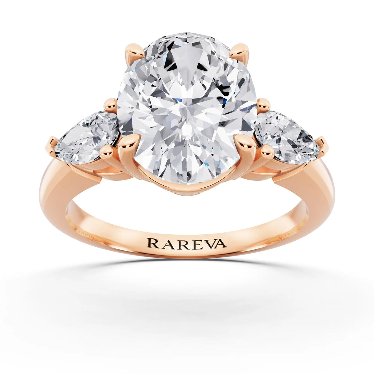 14 KT Rose Gold Oval Cut Diamond Three Stone Pear Accent Ring - front view