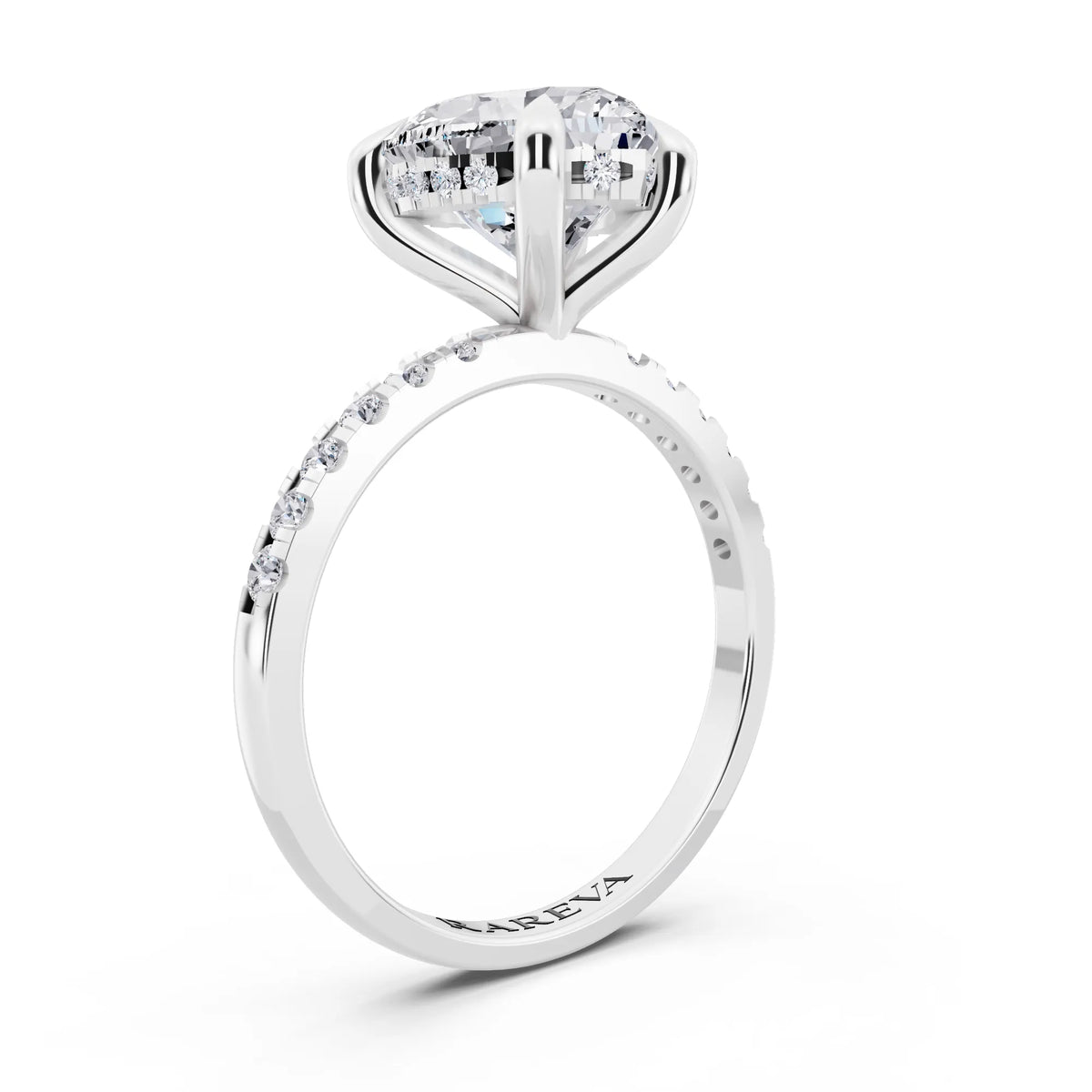 Platinum Heart Cut Diamond Solitaire Ring with Round Pavé Band and Prong Setting - top view