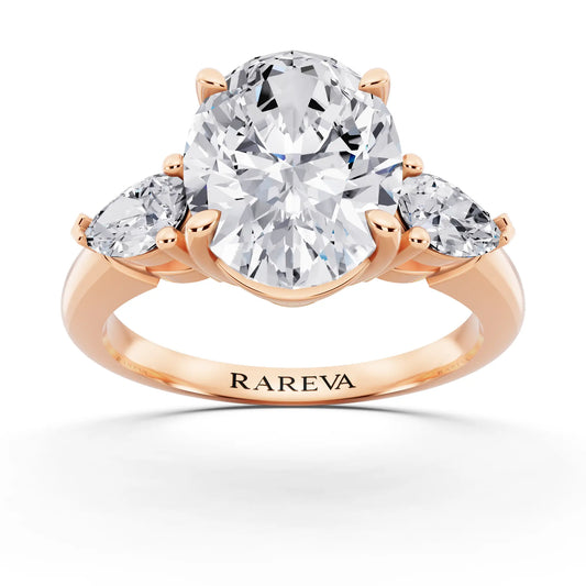 18 KT Rose Gold Oval Cut Diamond Three Stone Pear Accent Ring - front view