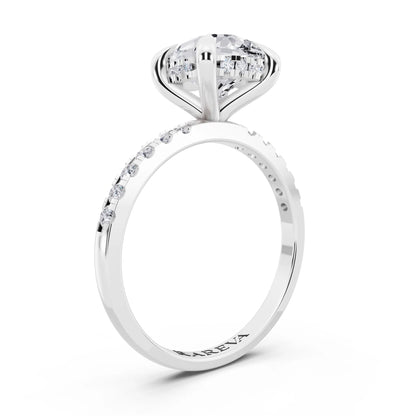 Platinum Pear Cut Diamond Solitaire Ring with Round Pavé Band and Prong Setting - top view
