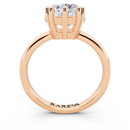 14 KT Rose Gold Round Cut Diamond Solitaire Ring with Hidden Accent Basket - through finger