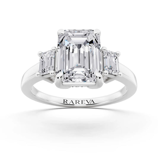 14 KT White Gold Emerald Cut Diamond Three Stone Emerald Accent Ring - front view