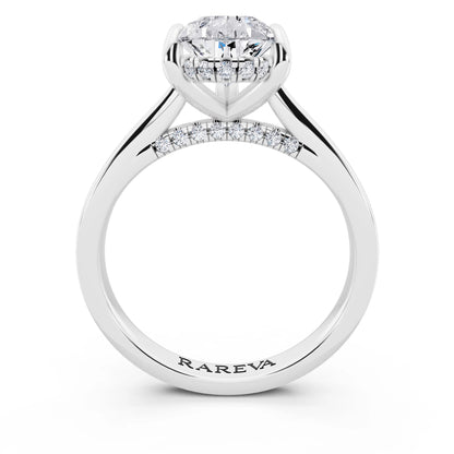 Platinum Pear Cut Diamond Solitaire Ring with Cathedral Band - through finger