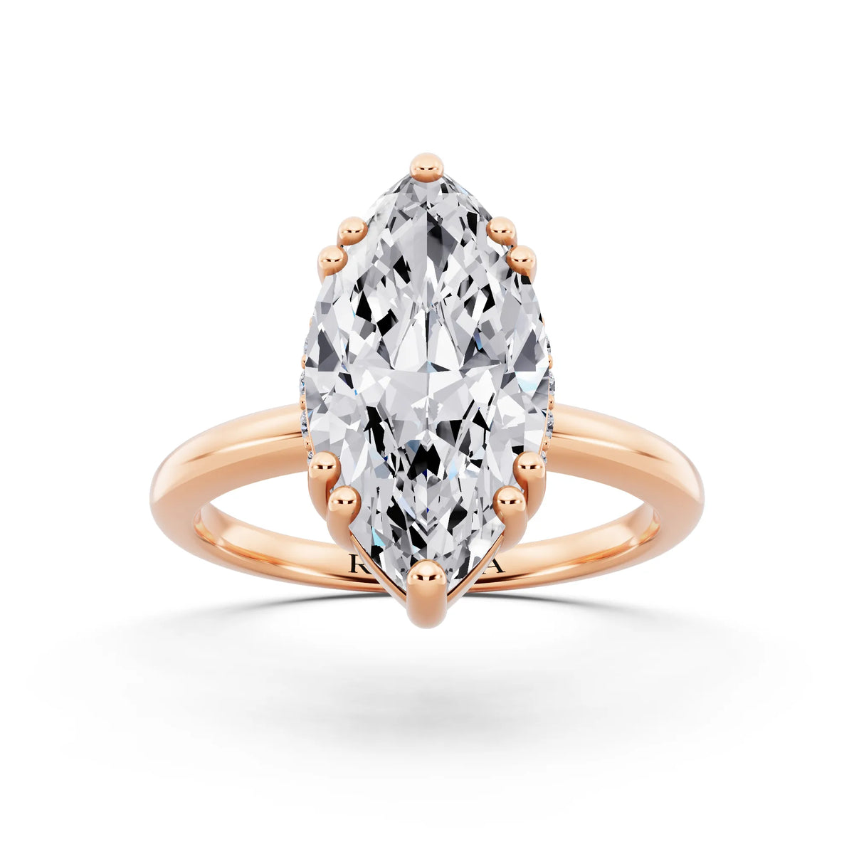 18 KT Rose Gold Marquise Cut Diamond Solitaire Ring with Hidden Accent Basket - front view