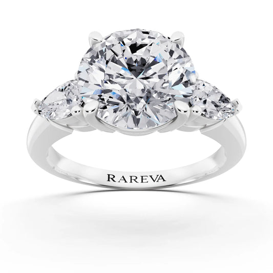 Platinum Round Cut Diamond Three Stone Pear Accent Ring - front view
