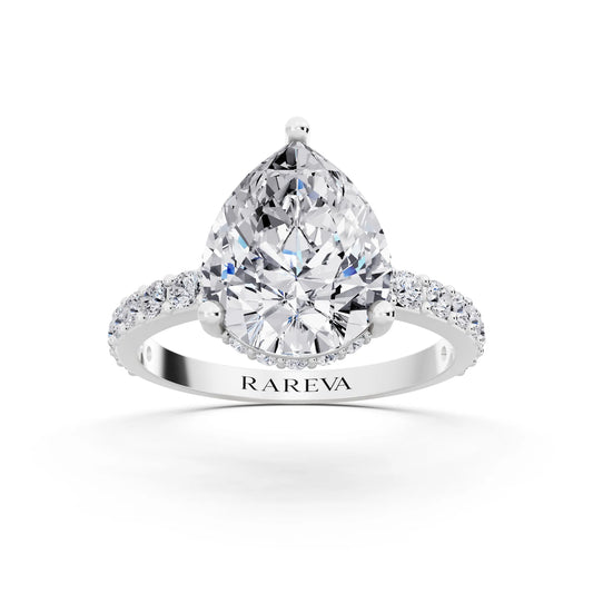 14 KT White Gold Pear Cut Diamond Solitaire Ring with Hidden Halo and Pave Band - front view