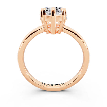 18 KT Rose Gold Marquise Cut Diamond Solitaire Ring with Hidden Accent Basket - through finger