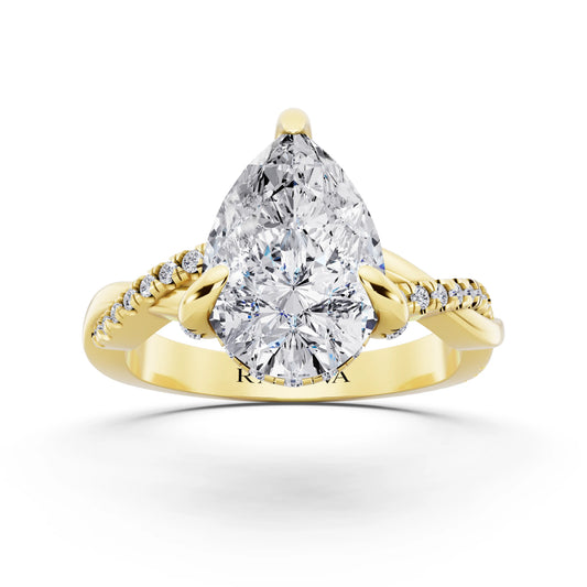 18 KT Yellow Gold Pear Cut Diamond Hidden Halo Ring with Twisted Pave Band - front view