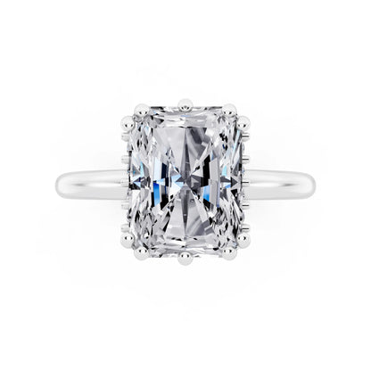 Platinum Radiant Cut Diamond Solitaire Ring with Hidden Accent Basket - top angle