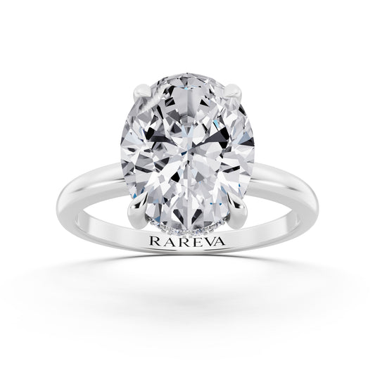 18 KT White Gold Oval Cut Diamond Solitaire Ring with Hidden Halo - front view