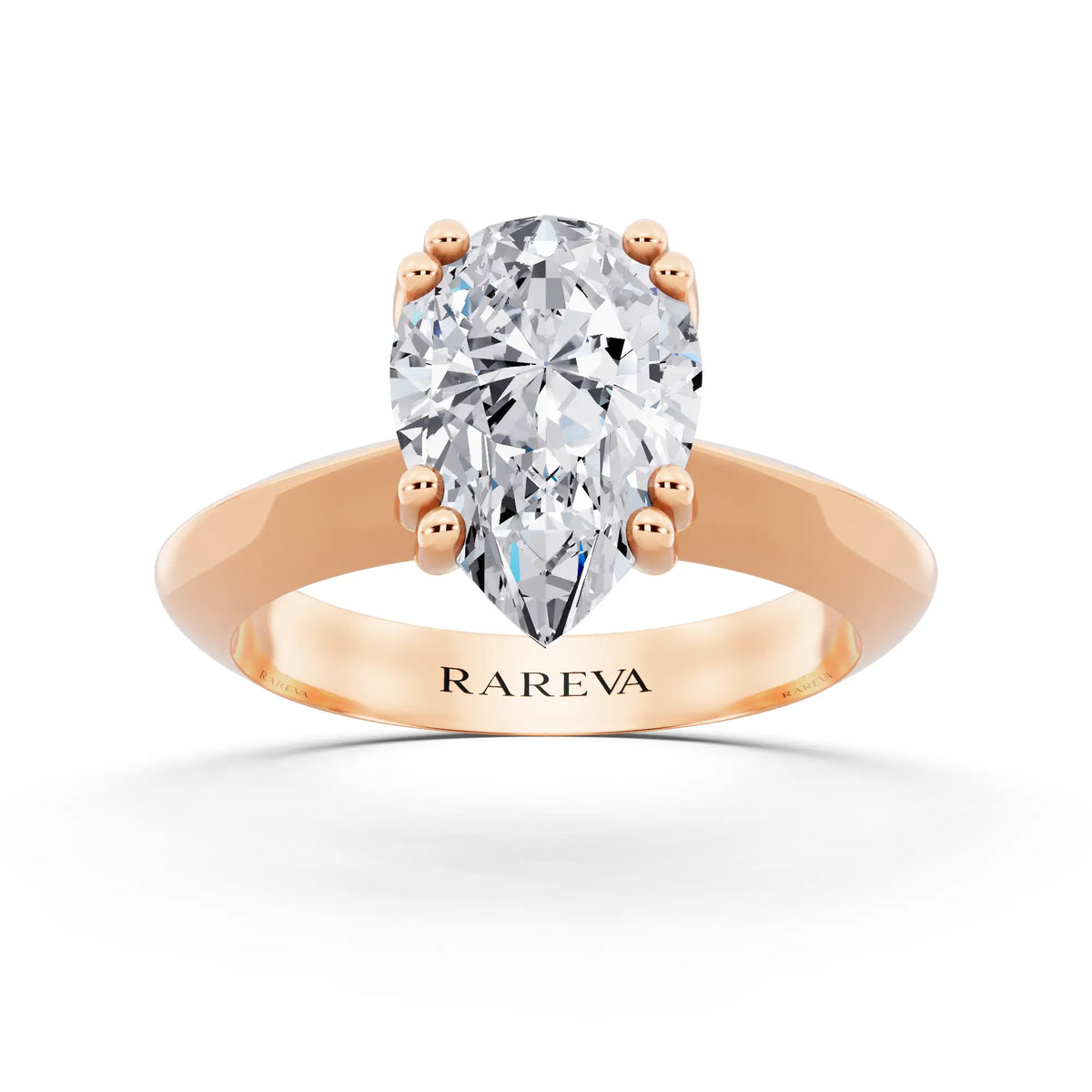 18 KT Rose Gold Pear Cut Diamond Solitaire Ring with Knife Edge Band - front view