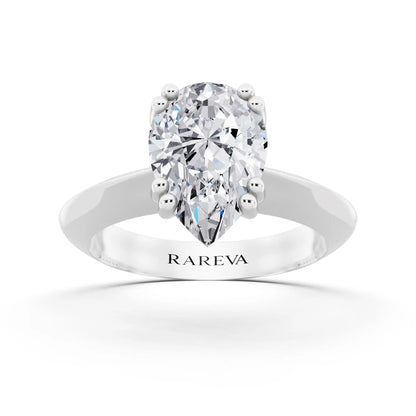 18 KT White Gold Pear Cut Diamond Solitaire Ring with Knife Edge Band - front view
