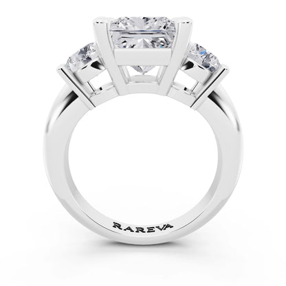 14 KT White Gold Princess Cut Diamond Three Stone Ring with Round Accents - through finger